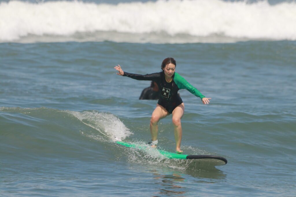 Guest riding a wave